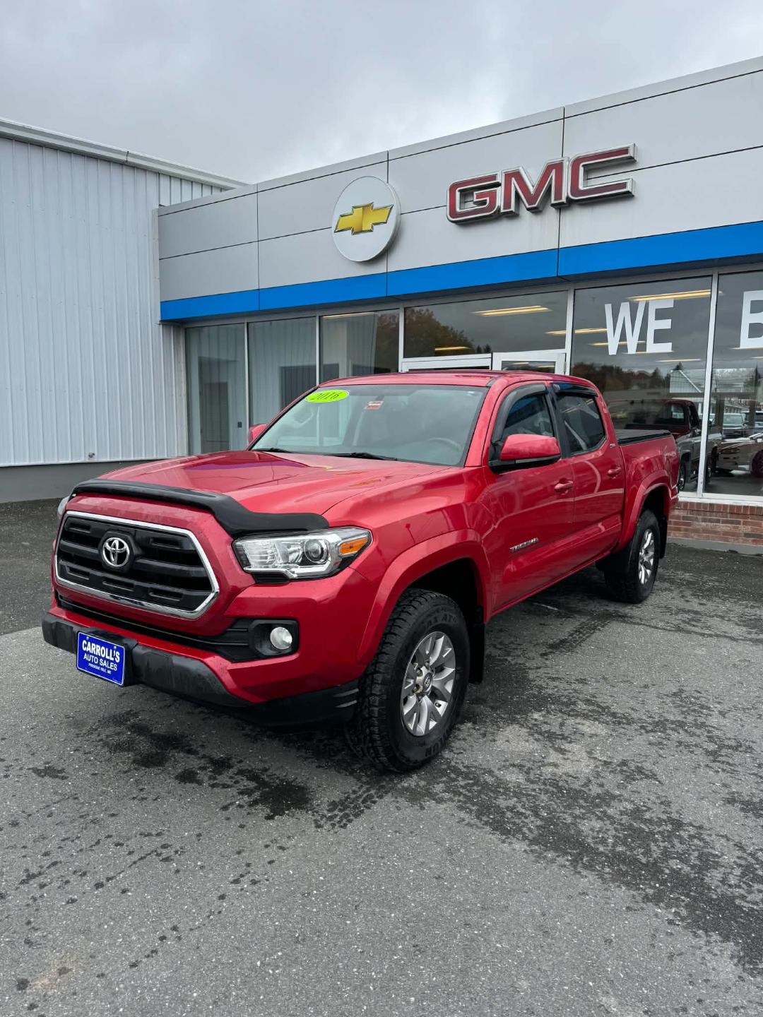 Red 2016 Toyota Tacoma Pickup Truck Four-Wheel Drive 